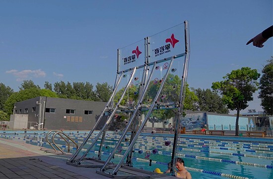 poolside climbing wall, poolside adventures, pool climbing wall, poolside climbing, water climbing walls, aquatic climbing, aquatic facility, poolside rock climbing walls, swimming pool climbing walls